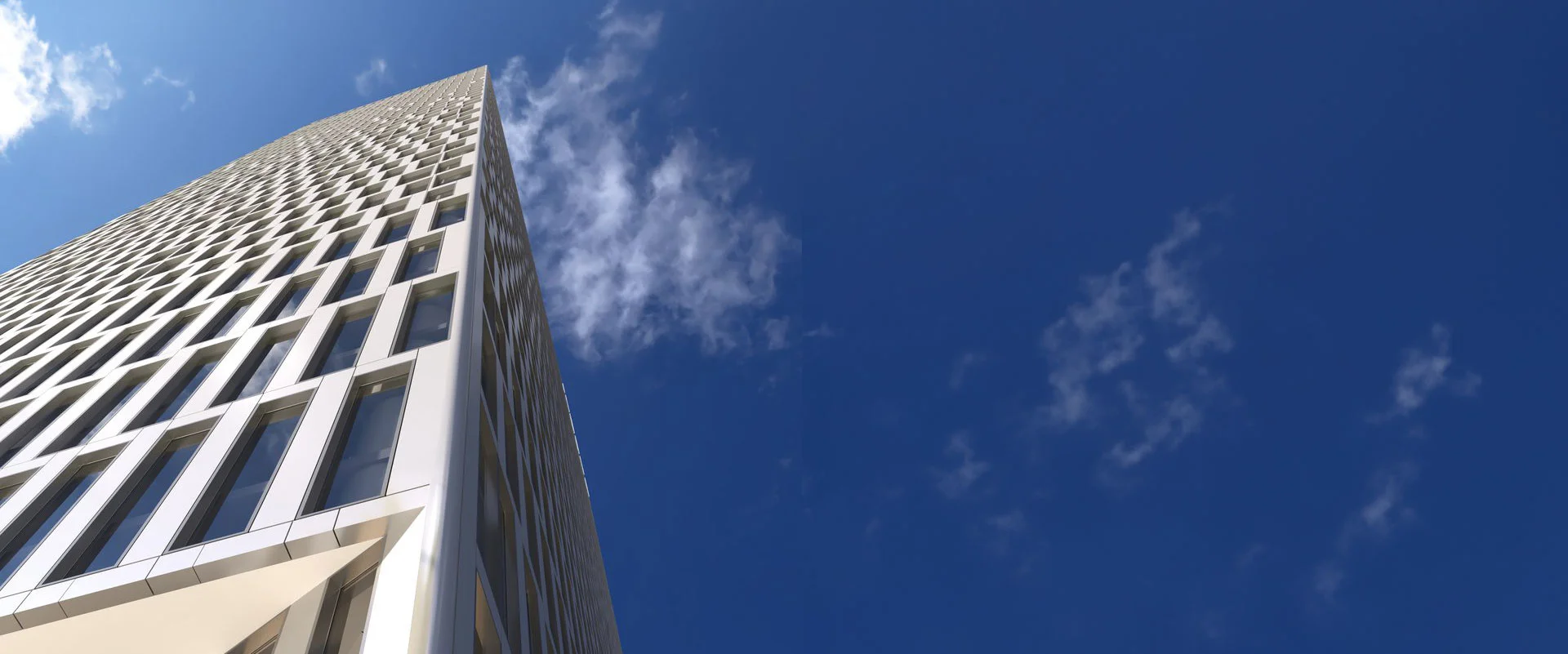 images/webp-images/SVB Realty's tall building under a clear blue sky